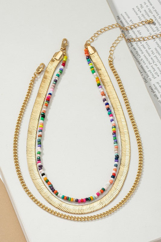 conjunto de cadena y gargantilla con diseño de espiga y cuentas de semillas