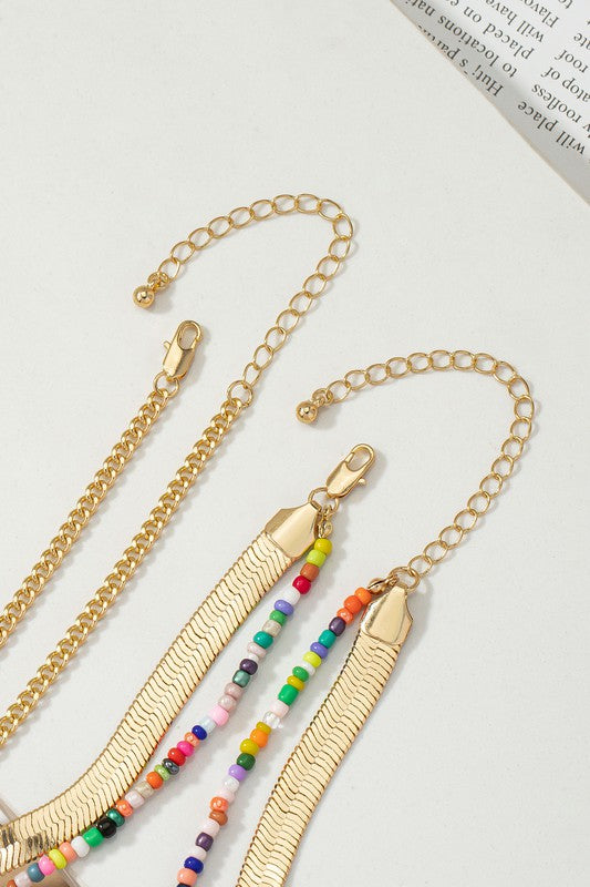 conjunto de cadena y gargantilla con diseño de espiga y cuentas de semillas