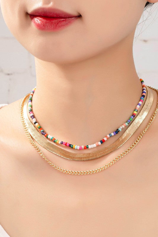 conjunto de cadena y gargantilla con diseño de espiga y cuentas de semillas