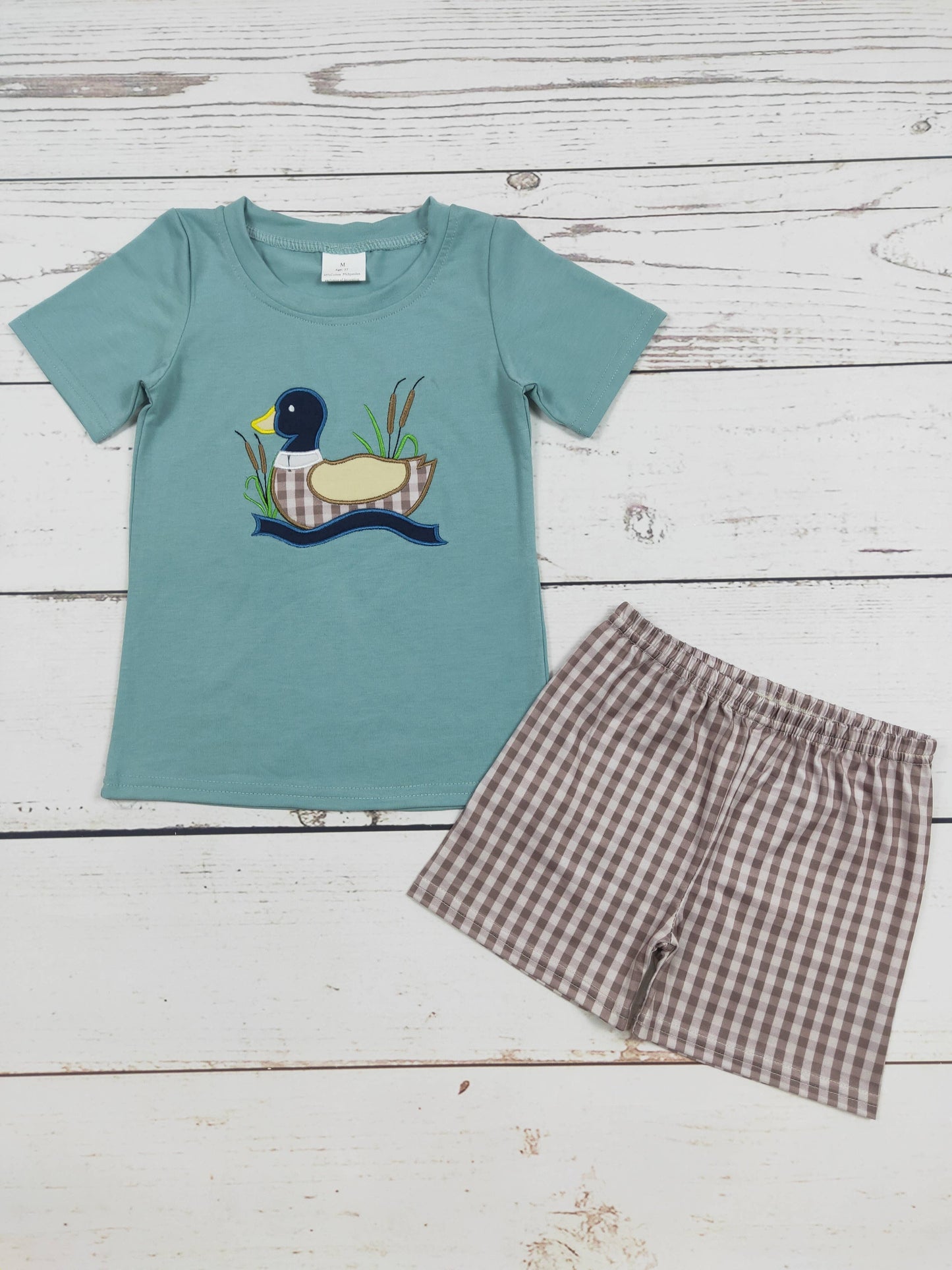 Conjunto de pato a cuadros bordado