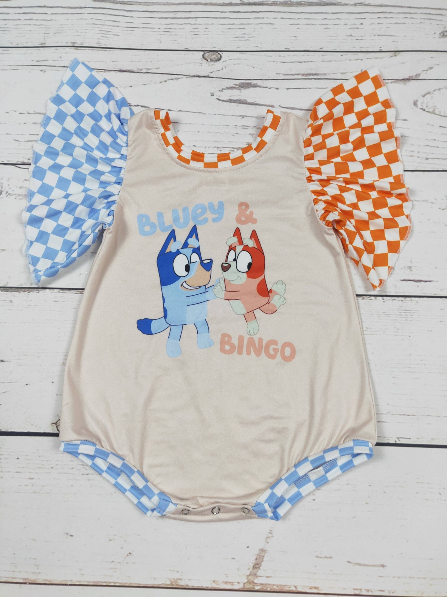 Burbuja a cuadros de perro azul y naranja
