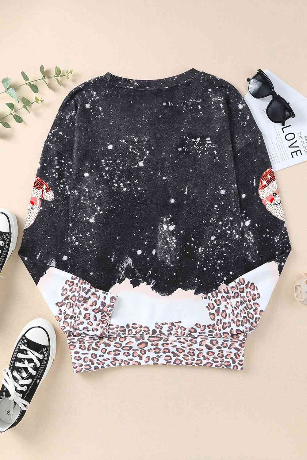 Sudadera con lentejuelas de Papá Noel y leopardo blanqueado