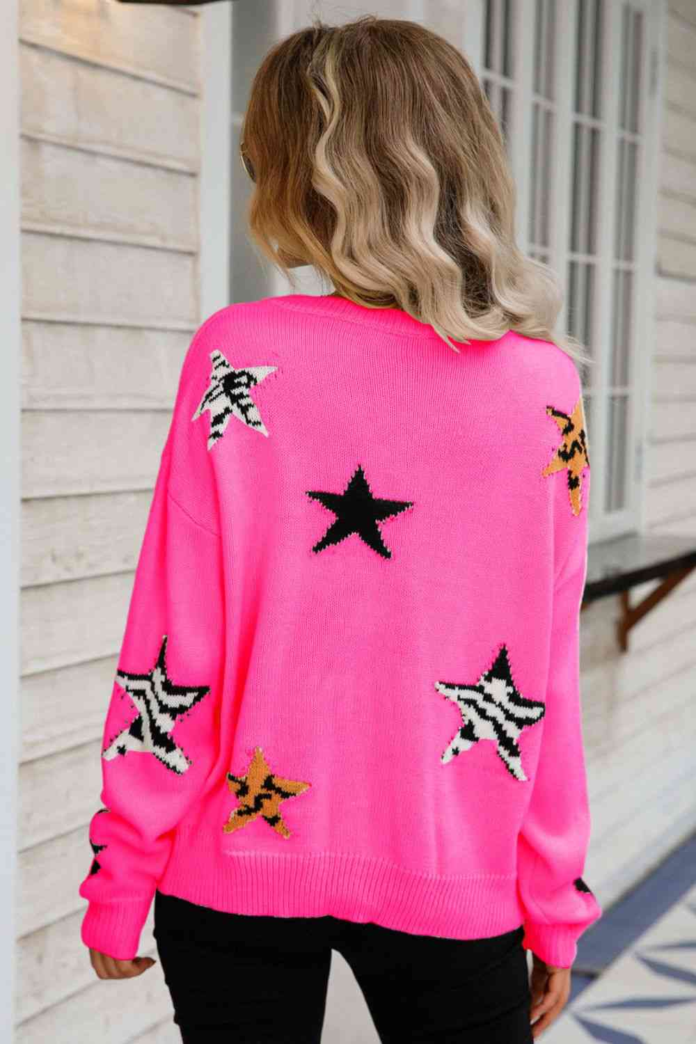 Jersey con estampado animal estrellado